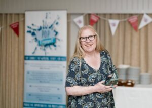 Jackie Lehane smiling at a Pop Connect networking event, representing the friendly and creative side of GwenGreen